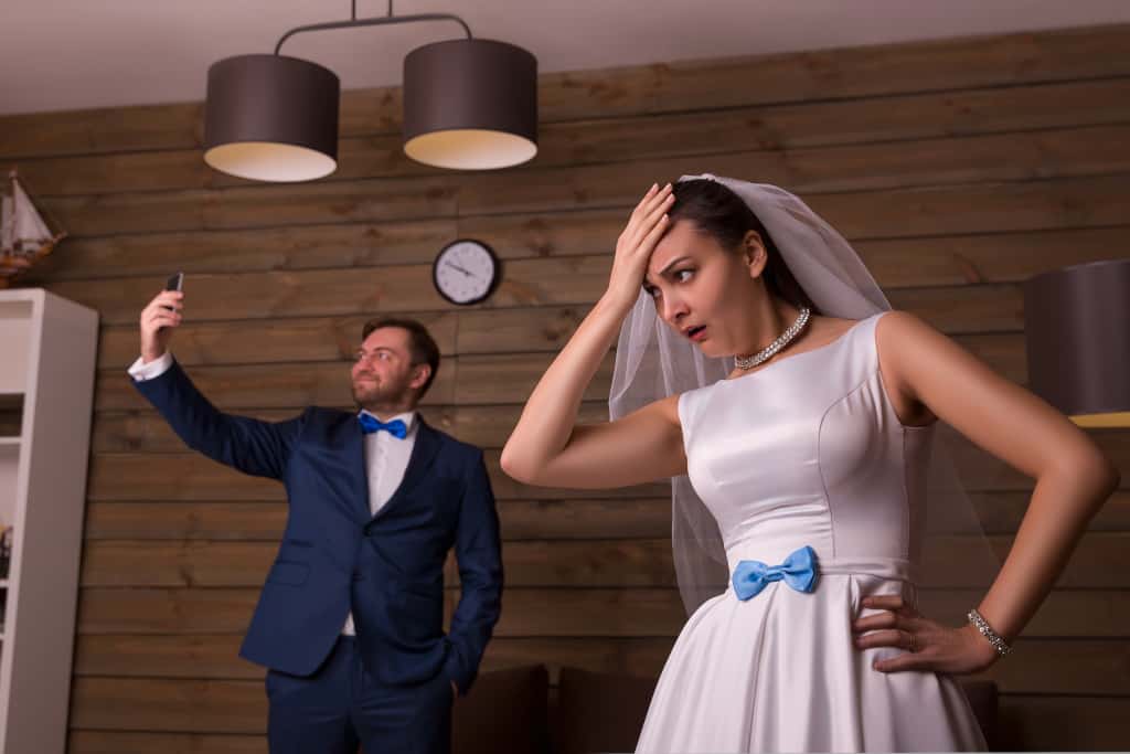 Bride unhappy about groom taking cell phone pictures